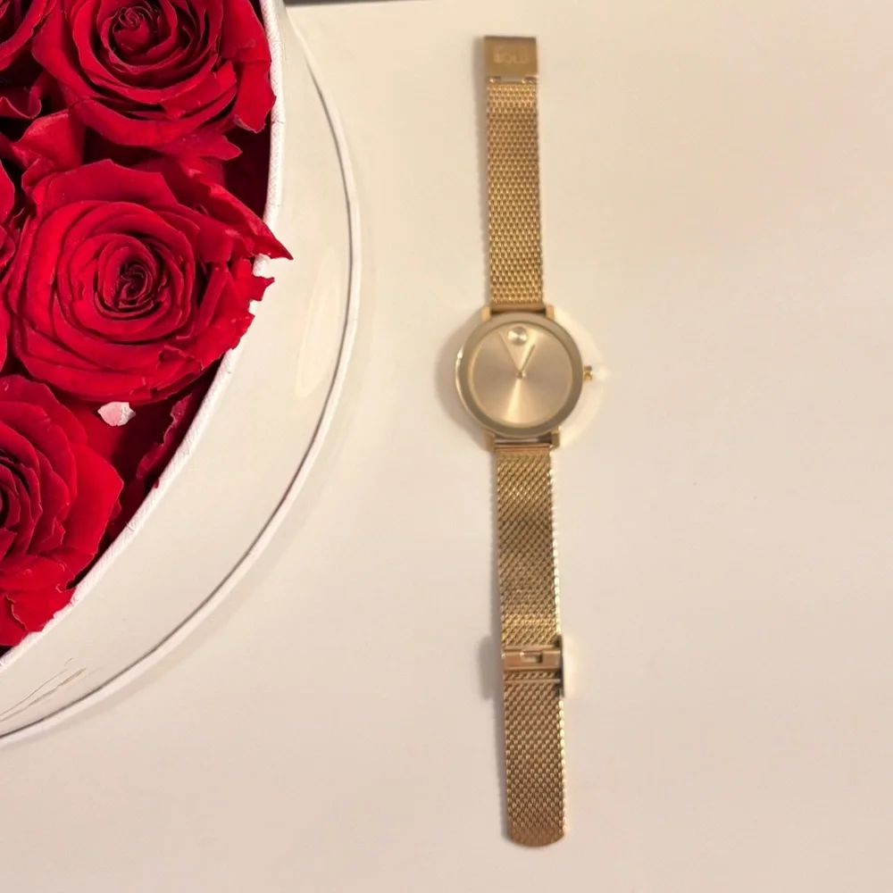 Movado Gold Mesh Women's Watch
Used in fair condition. Needs a new battery. - Picture 1 of 7